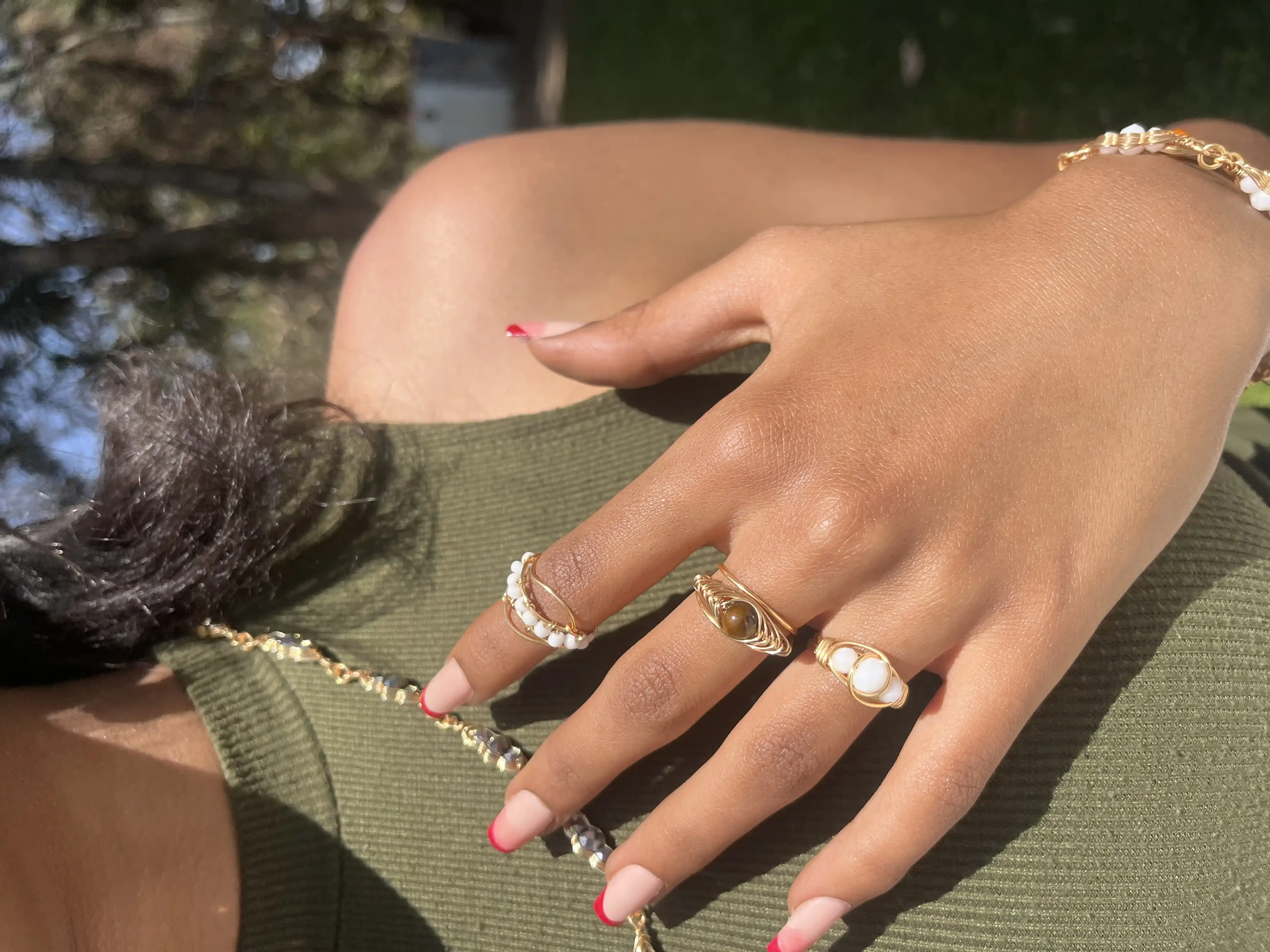 Biruh Adorn rings worn on hand