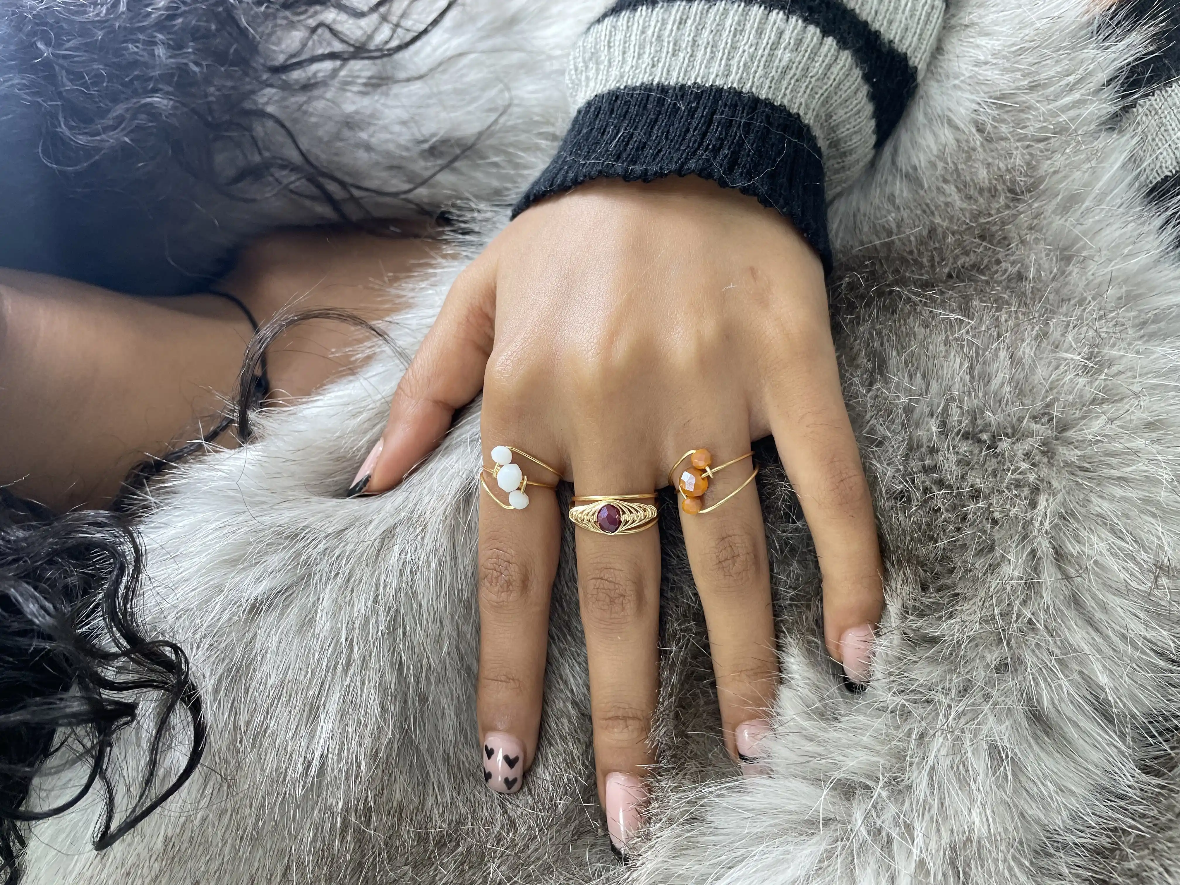 Biruh Adorn rings on hand