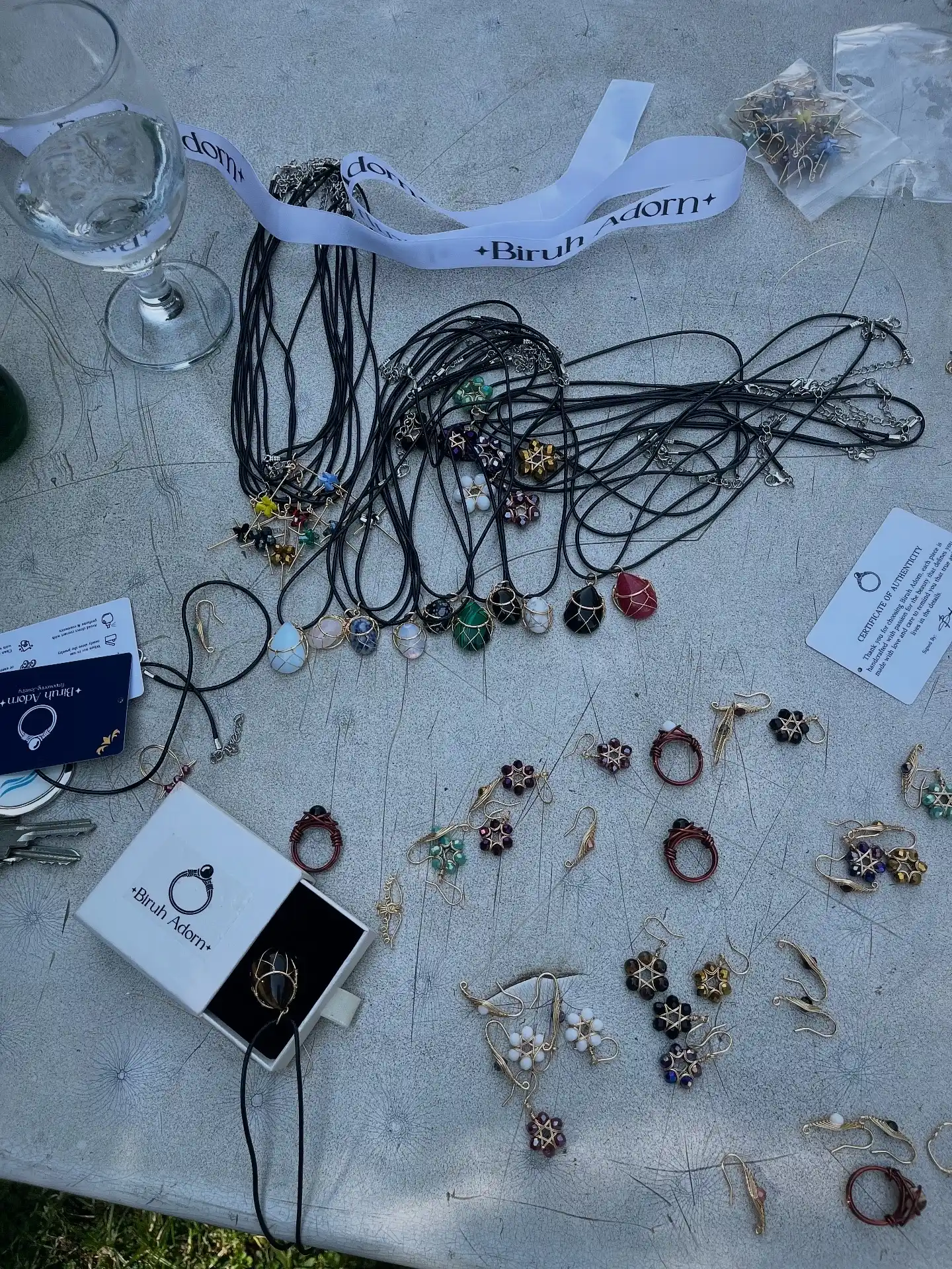 Biruh Adorn jewelry laid out on display